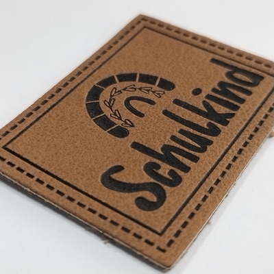 Microfiber Embossed Logo PU Leather Label Sew On Clothing Customize Design