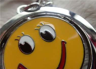 Color Silver Key Chain Personalized Promotional Gifts With Rotatable Smiling Yellow Face