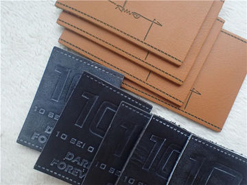 Eco - Friendly PU Leather Embossed Logo Patches For Jeans Pantone Color