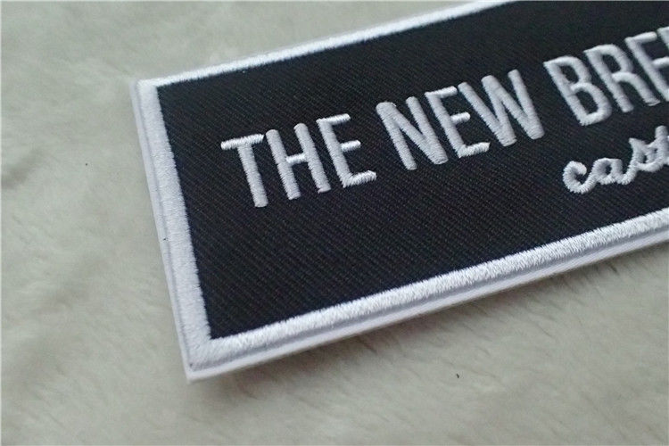 Washable Black Polyester Custom Clothing Patches / Adhesive Embroidered Patches