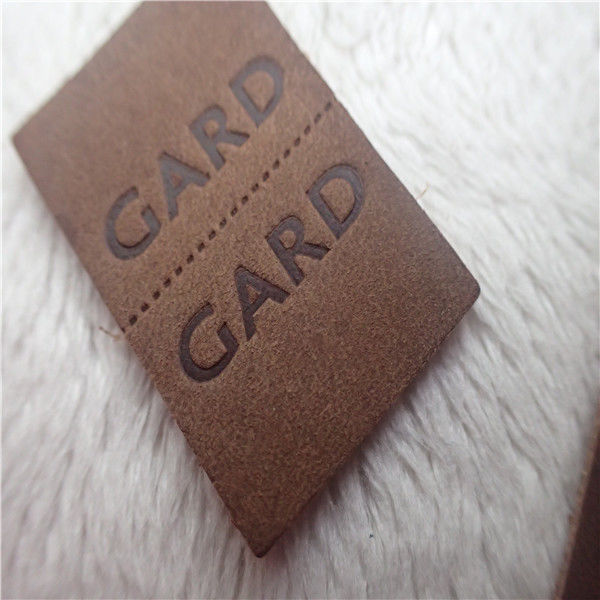 Embossed Leather Woven Label With Dashed Points Convenient To Mid Fold