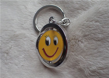 Color Silver Key Chain Personalized Promotional Gifts With Rotatable Smiling Yellow Face